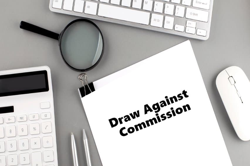 Draw Against Commission: What It Is, How It Works, & Examples image