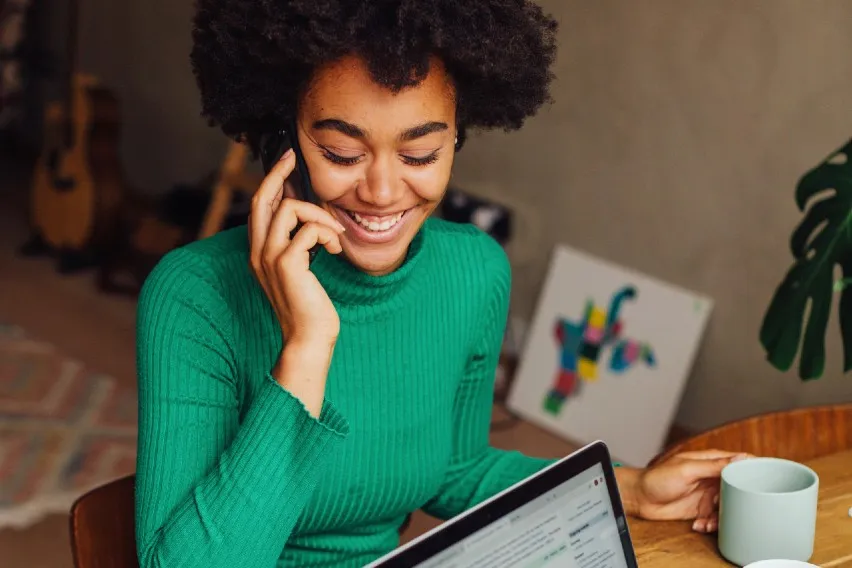 business owner on phone working from home